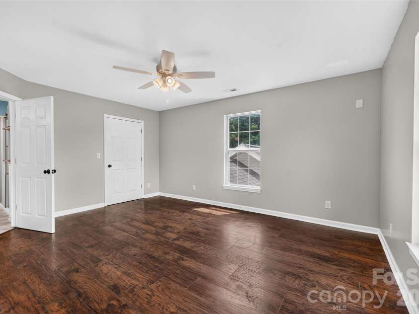 10724 Kingsview Drive, Davidson, NC 28036.  MLS# CAR4409874, YatesRealty ID 45444. Primary bedroom on second level.