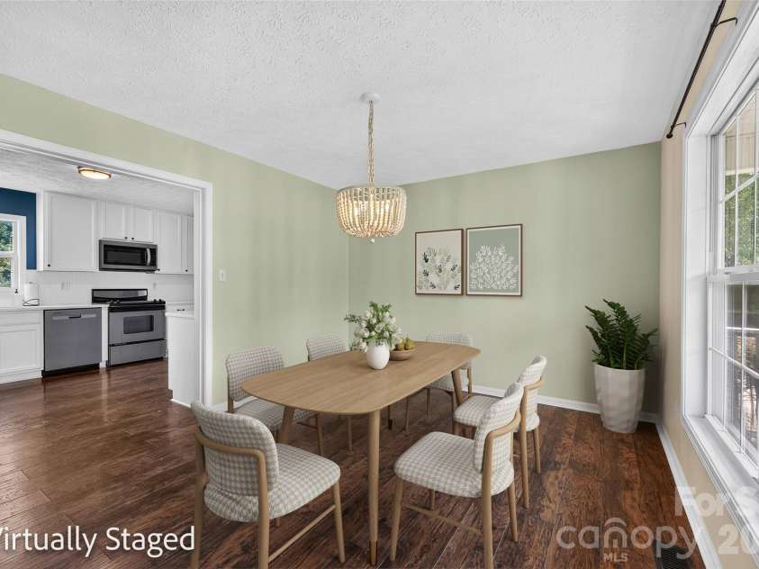 10724 Kingsview Drive, Davidson, NC 28036.  MLS# CAR4409874, YatesRealty ID 45444. Virtually staged dining room.