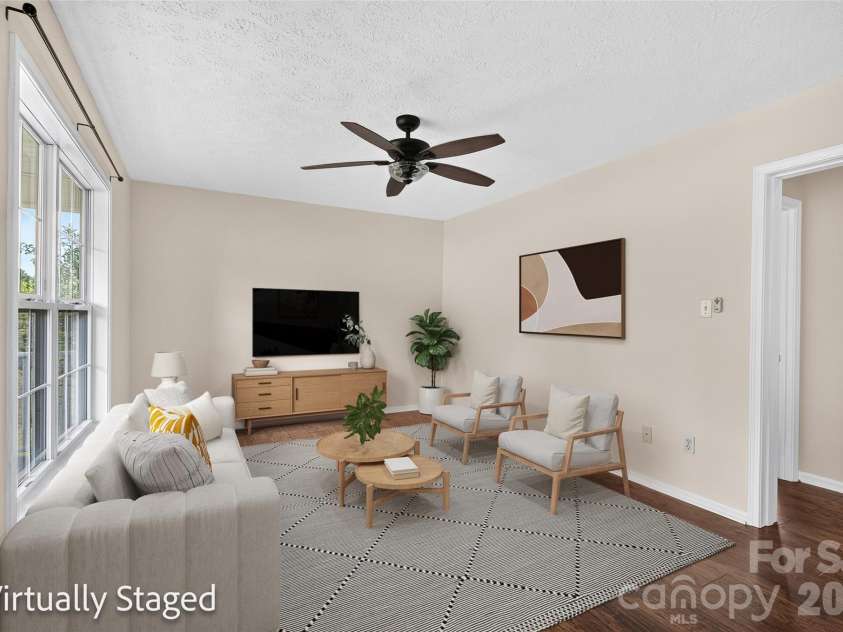 10724 Kingsview Drive, Davidson, NC 28036.  MLS# CAR4409874, YatesRealty ID 45444. Virtually staged great room.
