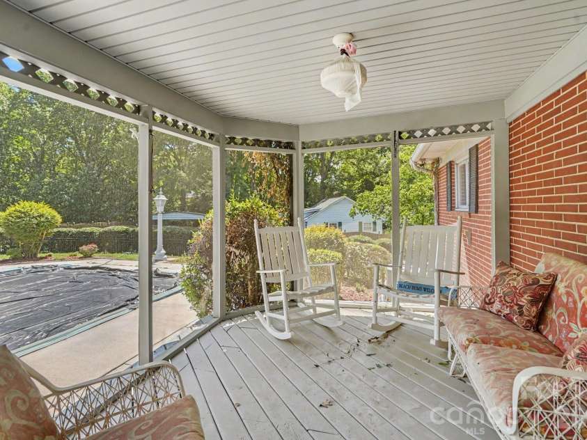 103 Dale Avenue, Kannapolis, NC 28081.  MLS# CAR4416135, YatesRealty ID 45445. This is a screened in porch with full backyard view.