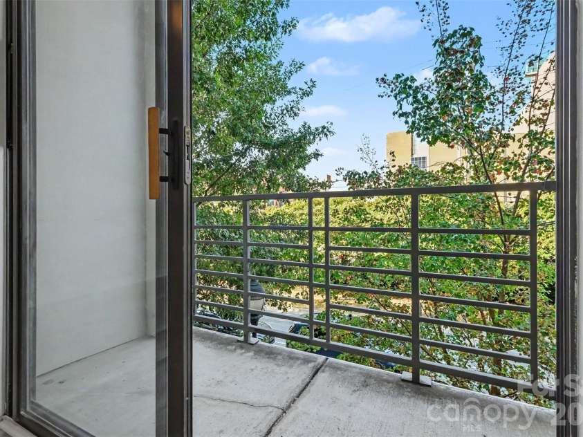 525 6th Street, Charlotte, NC 28202.  MLS# CAR4416190, YatesRealty ID 45446. Balcony with Sliding Door