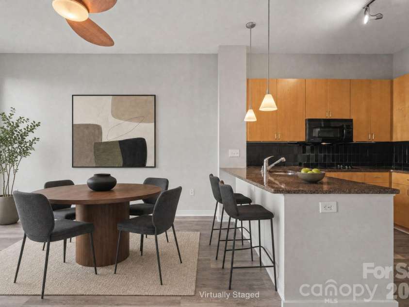 525 6th Street, Charlotte, NC 28202.  MLS# CAR4416190, YatesRealty ID 45446. Living Room & Kitchen Virtually Staged
