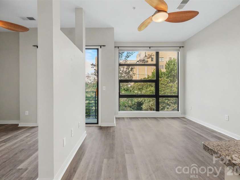 525 6th Street, Charlotte, NC 28202.  MLS# CAR4416190, YatesRealty ID 45446. Living room with Large Windows