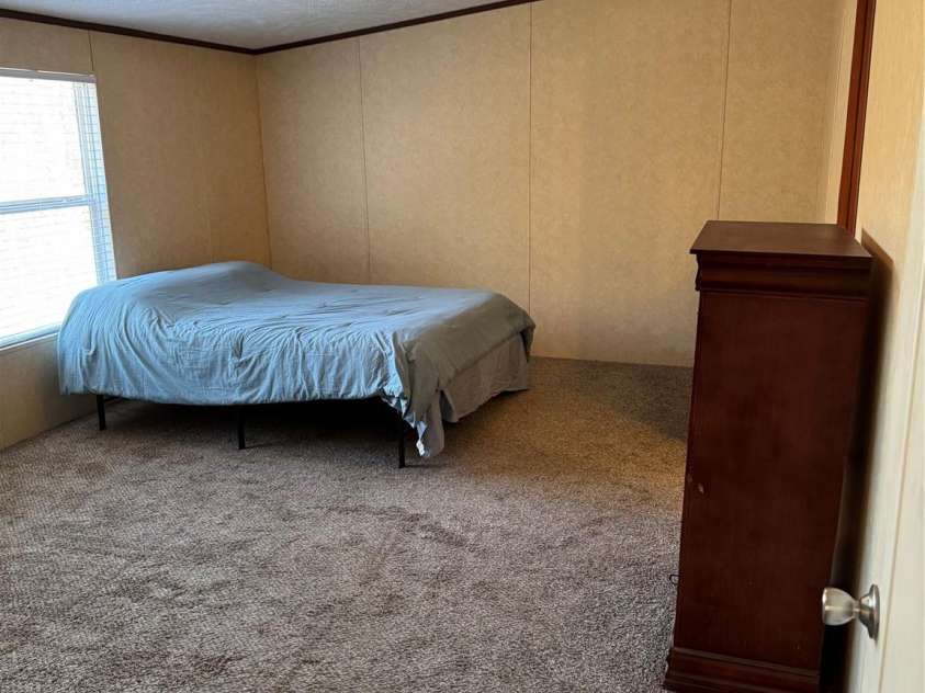 46 Slick Rock Road, Leicester, NC 28748.  MLS# CAR4220143, YatesRealty ID 4546. Primary Bedroom