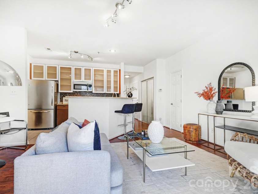 525 Graham Street, Charlotte, NC 28202.  MLS# CAR4341824, YatesRealty ID 4546. Thoughtfully designed living area that maximizes every square foot while feeling bright and spacious