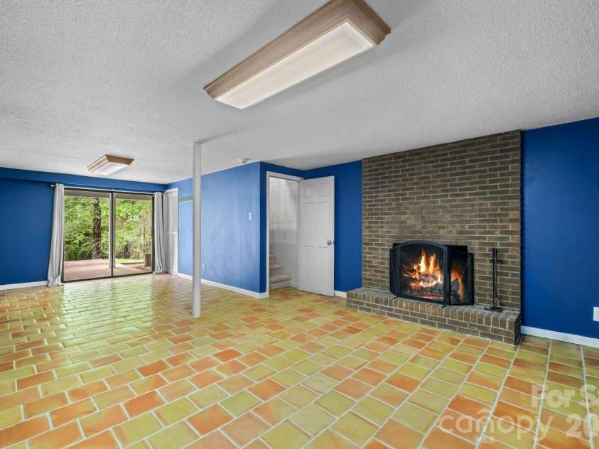98 Pensacola Avenue, Arden, NC 28704.  MLS# CAR4377061, YatesRealty ID 45460. Finished Basement