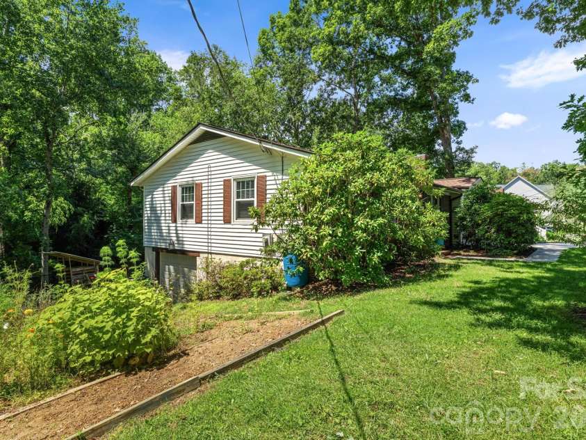 98 Pensacola Avenue, Arden, NC 28704.  MLS# CAR4377061, YatesRealty ID 45460. Side Yard