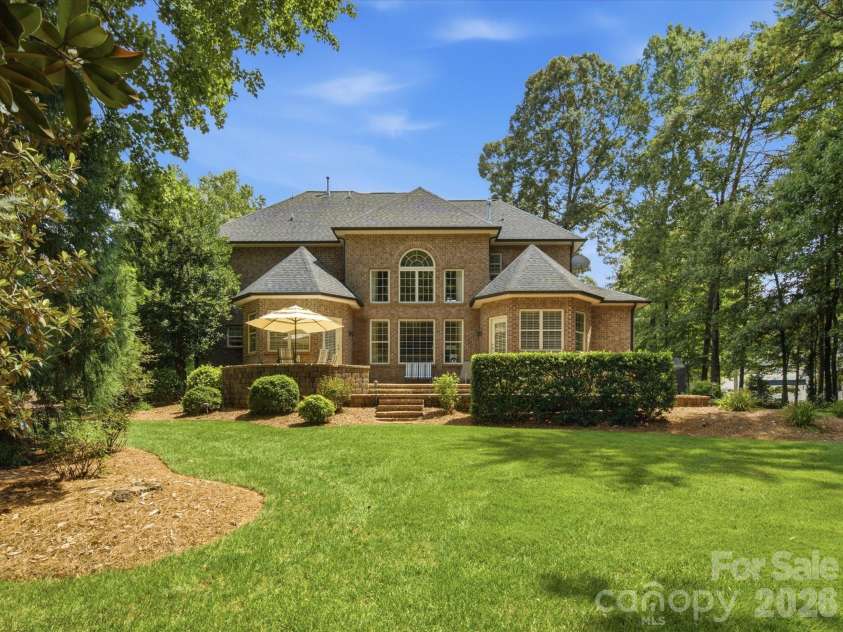 1023 Madras Court, Davidson, NC 28036.  MLS# CAR4415353, YatesRealty ID 45469. Backyard