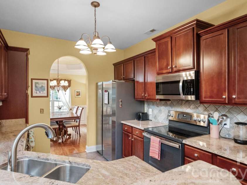 1115 Wind Chime Court, Monroe, NC 28110.  MLS# CAR4414656, YatesRealty ID 45484. 