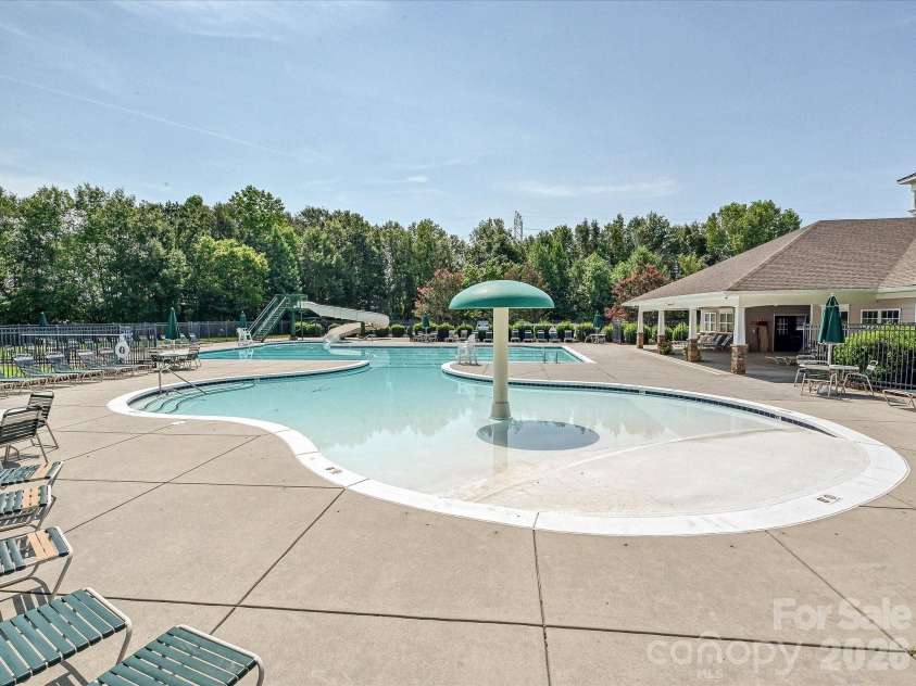216 Austin Field Court, Mount Holly, NC 28120.  MLS# CAR4414639, YatesRealty ID 45488. A splash pad with beach entry