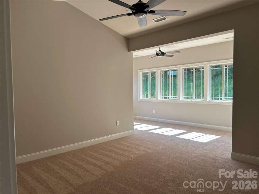 831-A Wynnshire Drive, Hickory, NC 28601.  MLS# CAR4413964, YatesRealty ID 45497. Master bedroom with added sun room