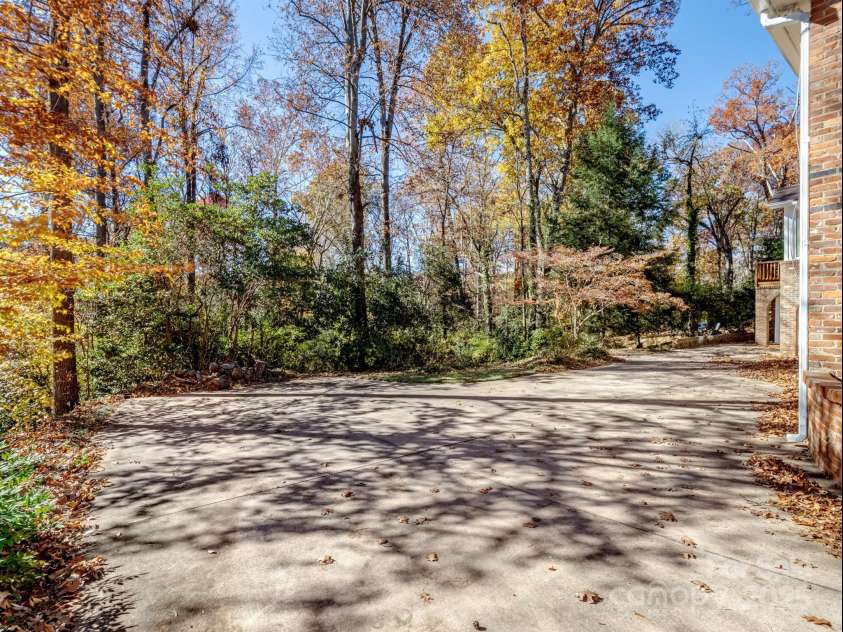 2111 Sagamore Road, Charlotte, NC 28209.  MLS# CAR4323130, YatesRealty ID 455. Abundance of parking 