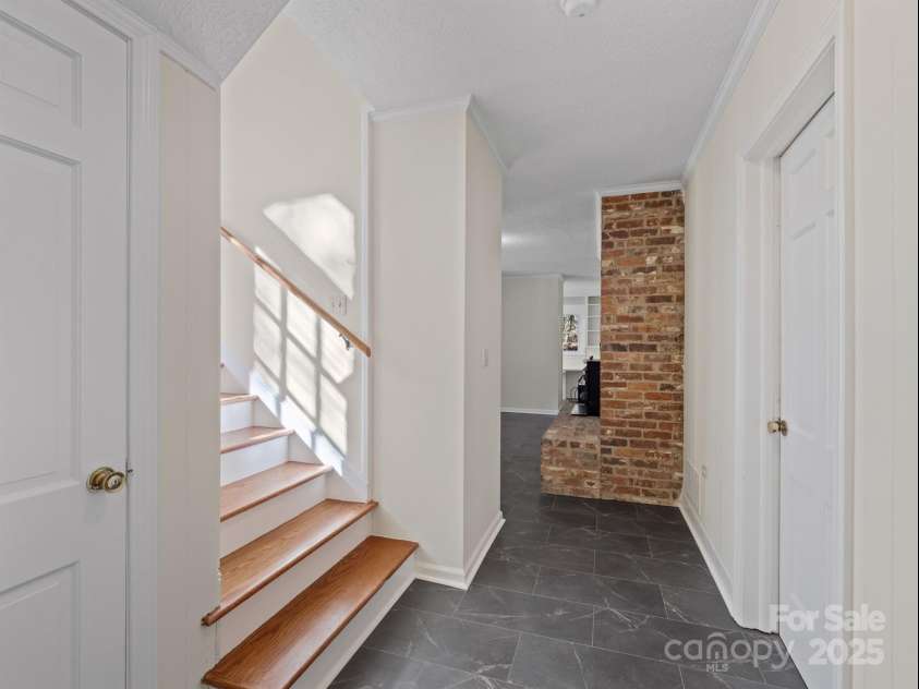 2111 Sagamore Road, Charlotte, NC 28209.  MLS# CAR4323130, YatesRealty ID 455. Lower level