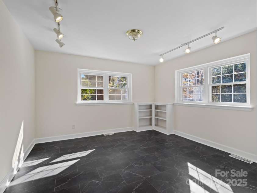 2111 Sagamore Road, Charlotte, NC 28209.  MLS# CAR4323130, YatesRealty ID 455. Lower level bedroom