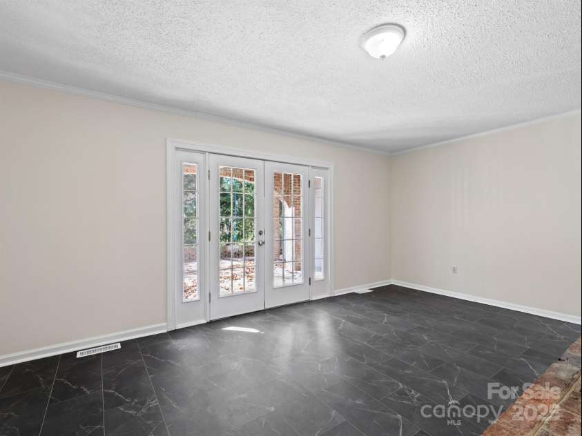 2111 Sagamore Road, Charlotte, NC 28209.  MLS# CAR4323130, YatesRealty ID 455. New LVT throughout lower level
