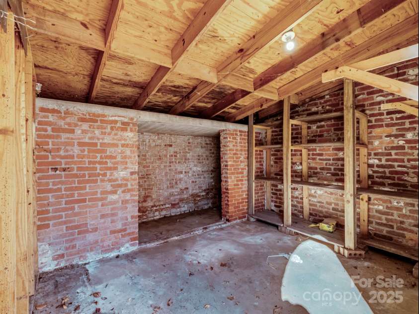 2111 Sagamore Road, Charlotte, NC 28209.  MLS# CAR4323130, YatesRealty ID 455. Spacious exterior storage with sliding doors for easy access 