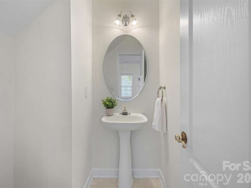 14015 Garden District Row, Huntersville, NC 28078.  MLS# CAR4414274, YatesRealty ID 45501. Half bath