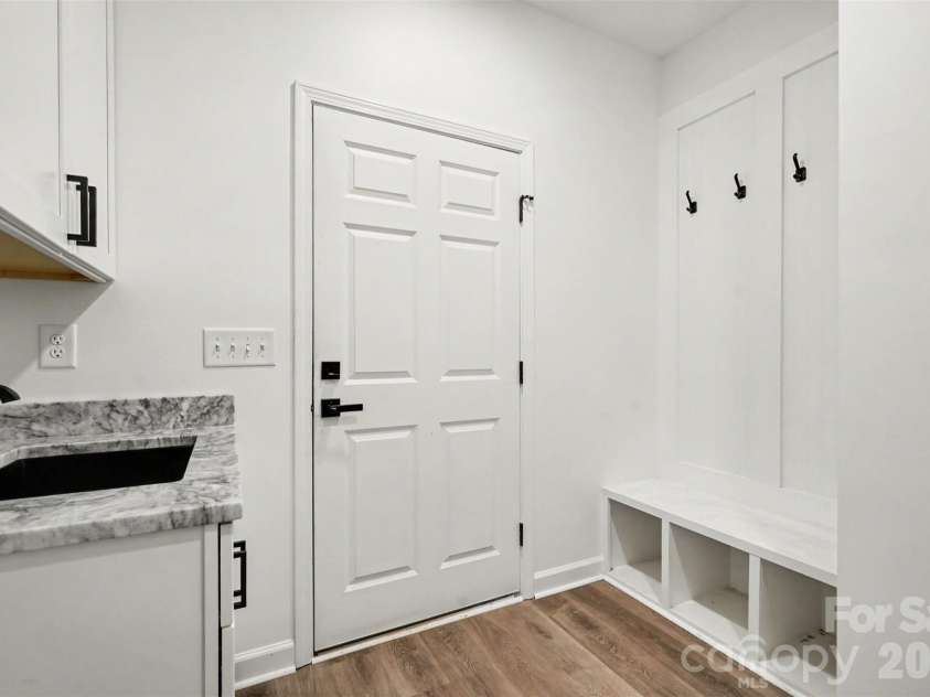 2416 Waxhaw Indian Trail Road, Indian Trail, NC 28079.  MLS# CAR4409507, YatesRealty ID 45502. Mudroom / exit to garage