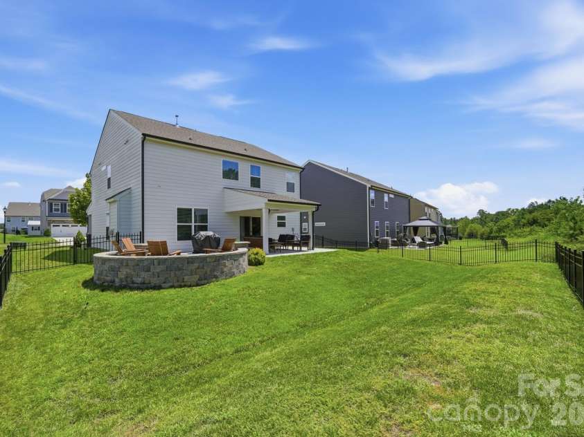 4492 Falls Lake Drive, Concord, NC 28025.  MLS# CAR4413181, YatesRealty ID 45507. Back View