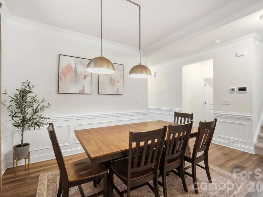 4492 Falls Lake Drive, Concord, NC 28025.  MLS# CAR4413181, YatesRealty ID 45507. Dining room with molding & columns.