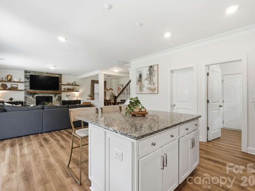 4492 Falls Lake Drive, Concord, NC 28025.  MLS# CAR4413181, YatesRealty ID 45507. Kitchen island has additional storage.