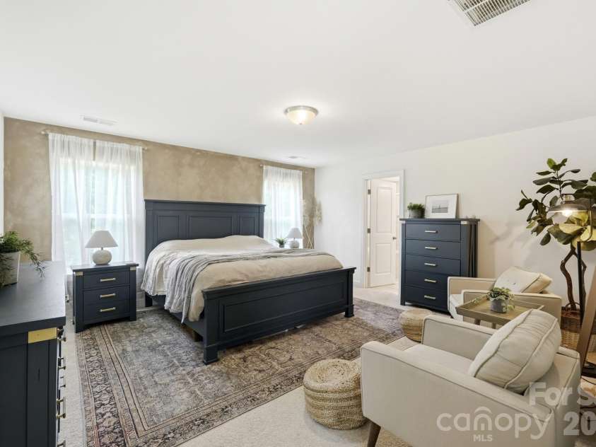 4492 Falls Lake Drive, Concord, NC 28025.  MLS# CAR4413181, YatesRealty ID 45507. Spacious Primary Suite