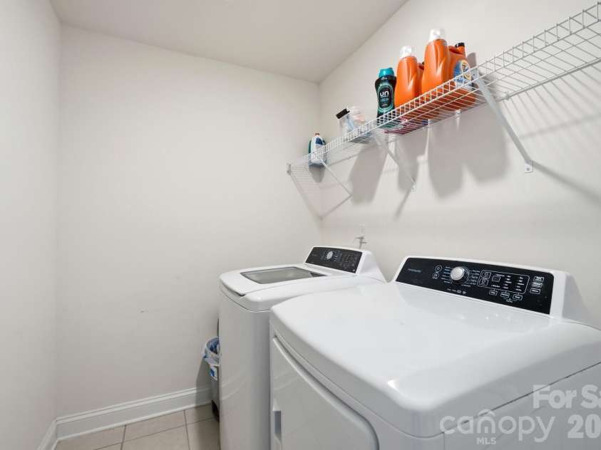 4492 Falls Lake Drive, Concord, NC 28025.  MLS# CAR4413181, YatesRealty ID 45507. Upstairs Laundry Room