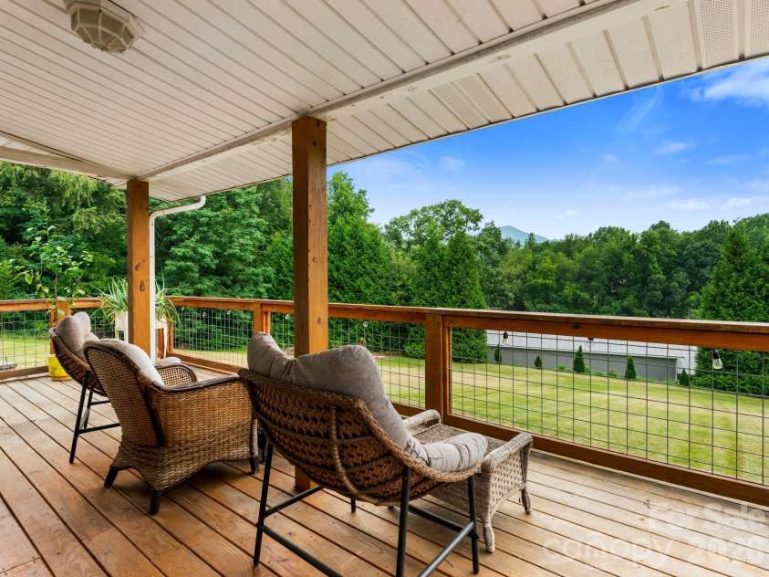 32 Fair Drive, Candler, NC 28715.  MLS# CAR4409961, YatesRealty ID 45509. Back deck
