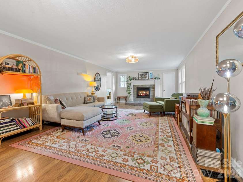 32 Fair Drive, Candler, NC 28715.  MLS# CAR4409961, YatesRealty ID 45509. *fireplace flame does not work. This is virtually staged to give an idea of what a fire could look like here.
