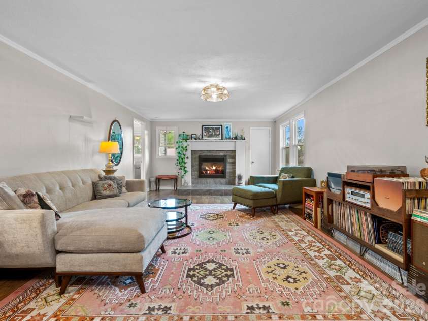 32 Fair Drive, Candler, NC 28715.  MLS# CAR4409961, YatesRealty ID 45509. *fireplace flame does not work. This is virtually staged to give an idea of what a fire could look like here.