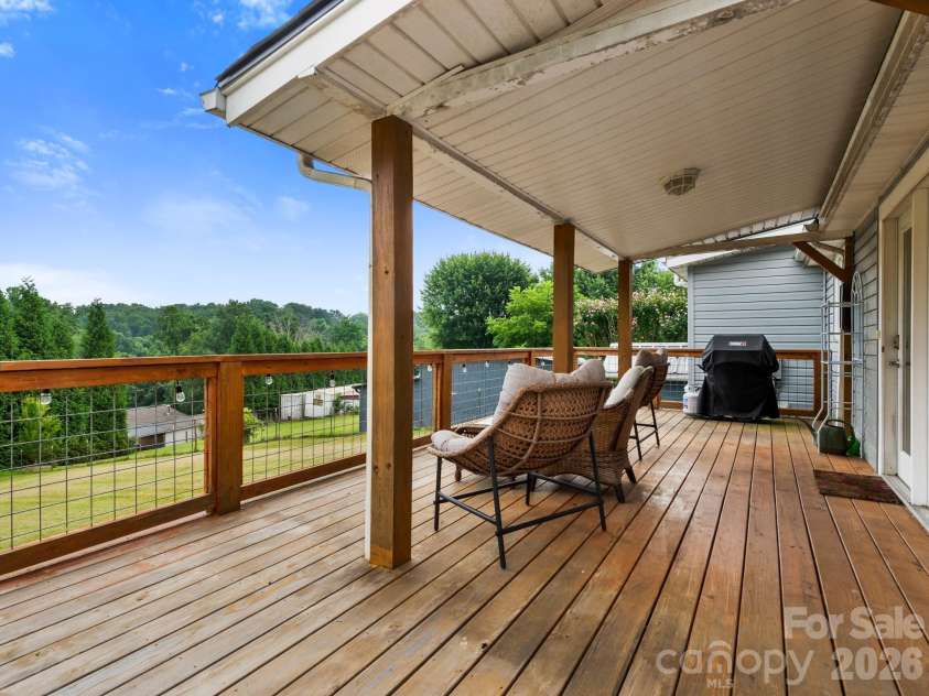 32 Fair Drive, Candler, NC 28715.  MLS# CAR4409961, YatesRealty ID 45509. Private back deck partly covered