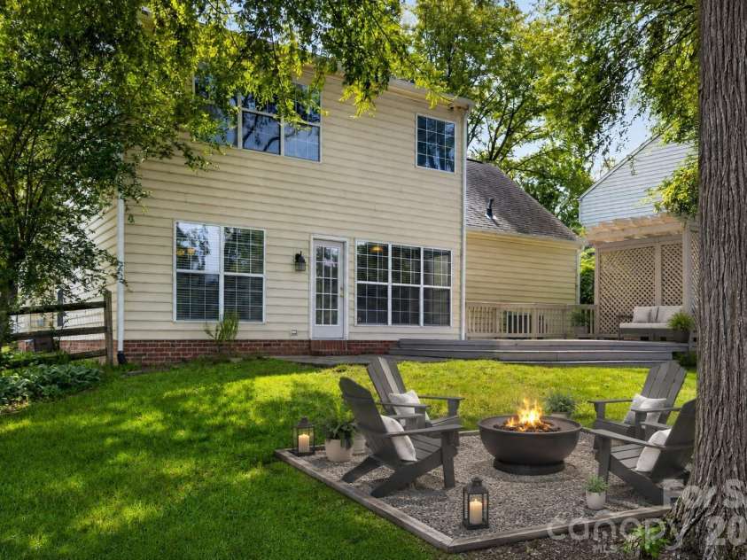 5936 Downfield Wood Drive, Charlotte, NC 28269.  MLS# CAR4413592, YatesRealty ID 45510. Backyard Fire Pit & Outdoor Gathering Area – Virtually Staged