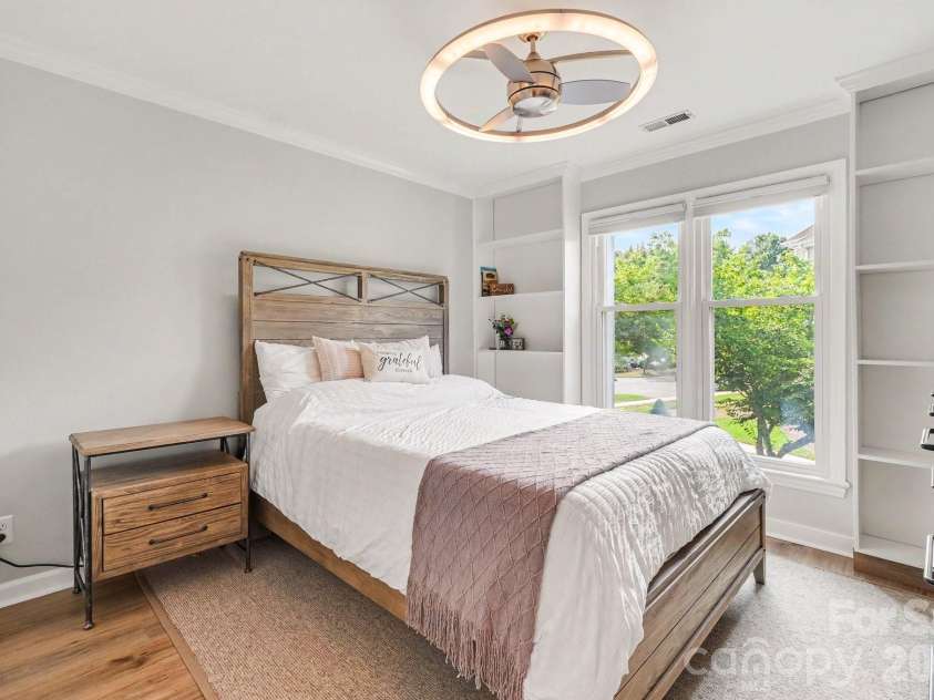18613 Vineyard Point Lane, Cornelius, NC 28031.  MLS# CAR4409285, YatesRealty ID 45514. 2nd Bedroom features updated flooring and lighting