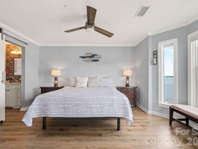 18613 Vineyard Point Lane, Cornelius, NC 28031.  MLS# CAR4409285, YatesRealty ID 45514. All windows point to waterfront views