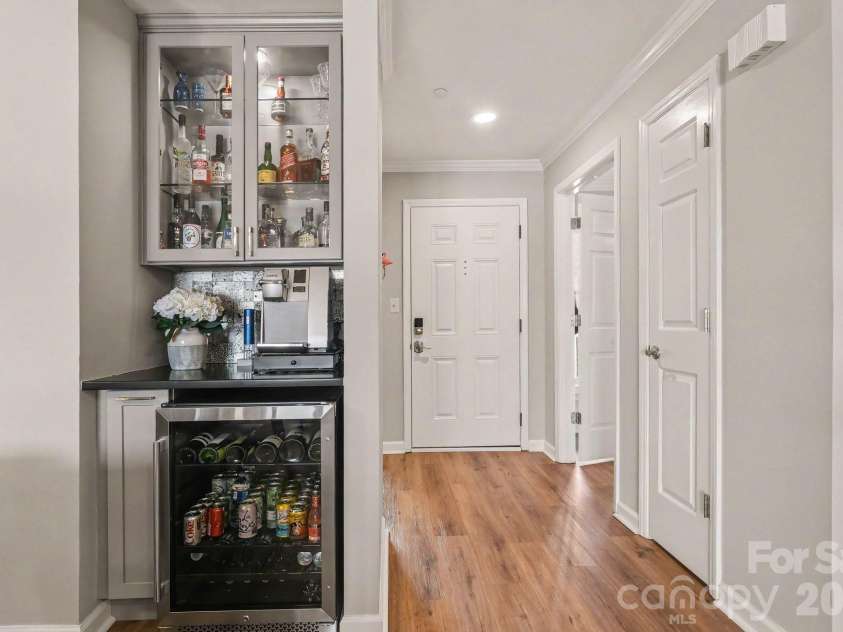 18613 Vineyard Point Lane, Cornelius, NC 28031.  MLS# CAR4409285, YatesRealty ID 45514. Built in Commercial Coffee maker! (Never add water)! Beverage refrigerator conveys