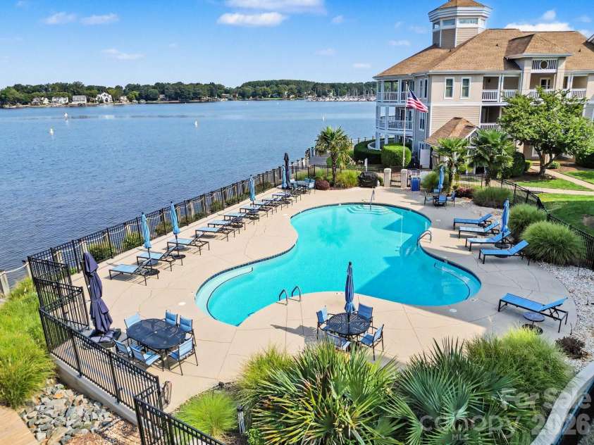 18613 Vineyard Point Lane, Cornelius, NC 28031.  MLS# CAR4409285, YatesRealty ID 45514. Community Pool right on the water
