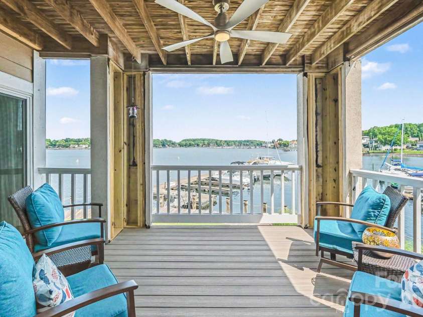 18613 Vineyard Point Lane, Cornelius, NC 28031.  MLS# CAR4409285, YatesRealty ID 45514. Large Patio Balcony perfect for sunsets water views and entertaining. (HOA is currently repairing pillars to be completed by the fall)