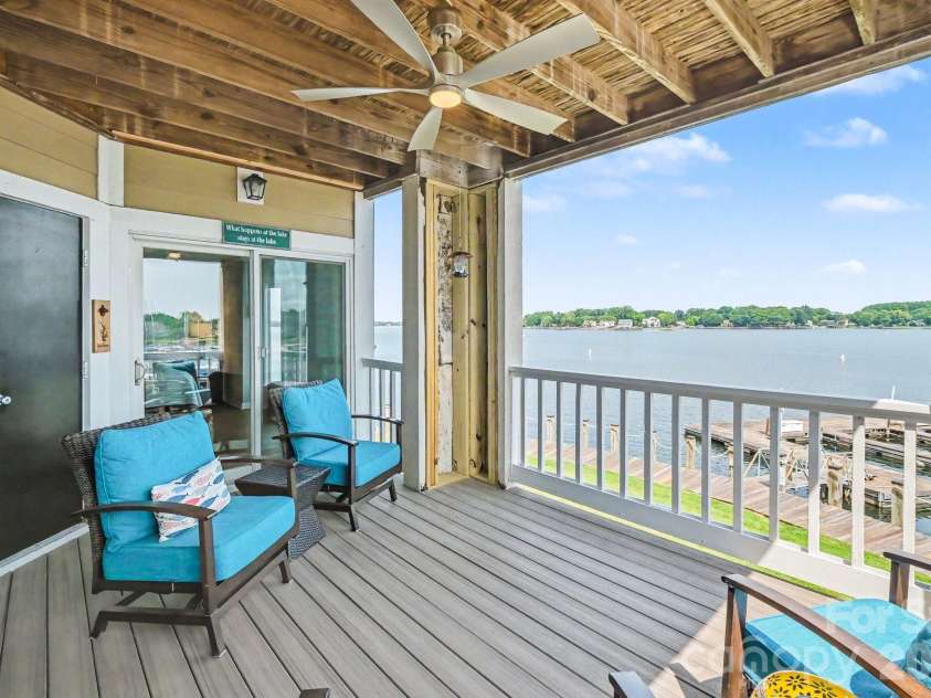 18613 Vineyard Point Lane, Cornelius, NC 28031.  MLS# CAR4409285, YatesRealty ID 45514. Outside  features TREX and an expanded storage area and gorgeous views (HOA is currently repairing pillars to be completed by the fall)