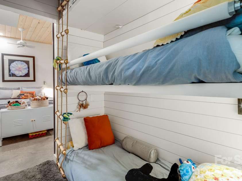 2752 Gerton Highway, Gerton, NC 28735.  MLS# CAR4409357, YatesRealty ID 45515. Built-in bunk area creates a fun and functional additional sleeping space on the terrace level.