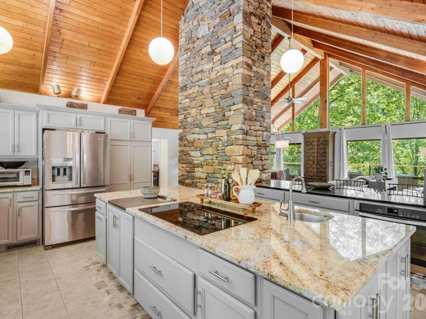2752 Gerton Highway, Gerton, NC 28735.  MLS# CAR4409357, YatesRealty ID 45515. Large center island provides additional workspace and casual seating