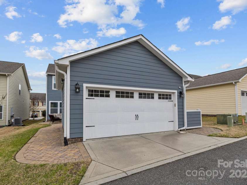 12545 Druids Glen Drive, Pineville, NC 28134.  MLS# CAR4234518, YatesRealty ID 4552. Detached finished 2-car garage