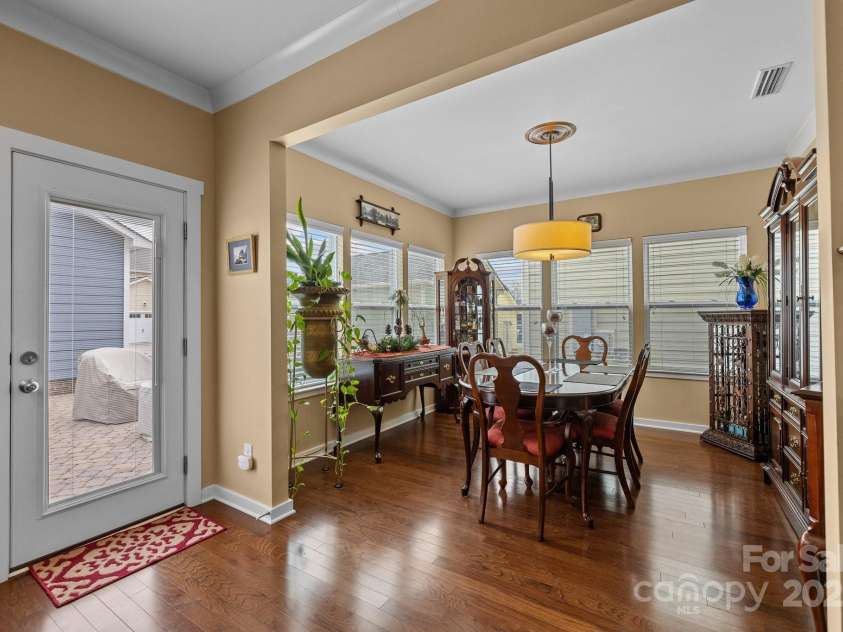 12545 Druids Glen Drive, Pineville, NC 28134.  MLS# CAR4234518, YatesRealty ID 4552. Dining room overlooks patio