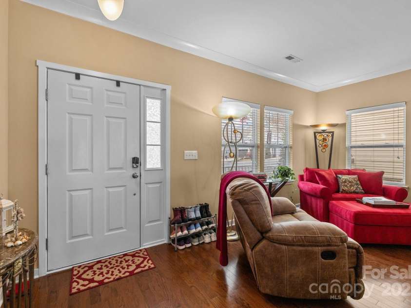 12545 Druids Glen Drive, Pineville, NC 28134.  MLS# CAR4234518, YatesRealty ID 4552. Foyer & open living room