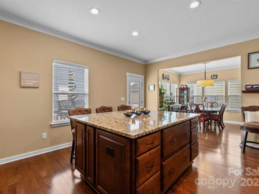 12545 Druids Glen Drive, Pineville, NC 28134.  MLS# CAR4234518, YatesRealty ID 4552. Large custom island has room for casual dining