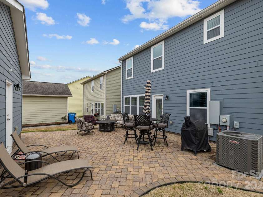 12545 Druids Glen Drive, Pineville, NC 28134.  MLS# CAR4234518, YatesRealty ID 4552. Oversized brick paver patio