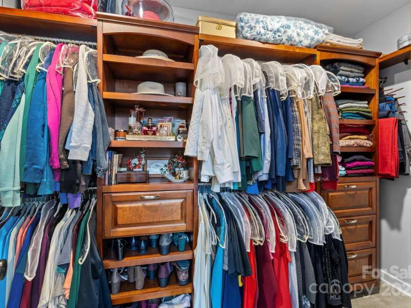 12545 Druids Glen Drive, Pineville, NC 28134.  MLS# CAR4234518, YatesRealty ID 4552. Primary closet with custom closet system