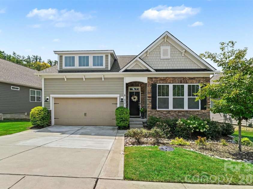 676 Latrobe Drive, Iron Station, NC 28080.  MLS# CAR4401657, YatesRealty ID 45521. Beautiful front elevation with attractive landscaping and welcoming curb appeal