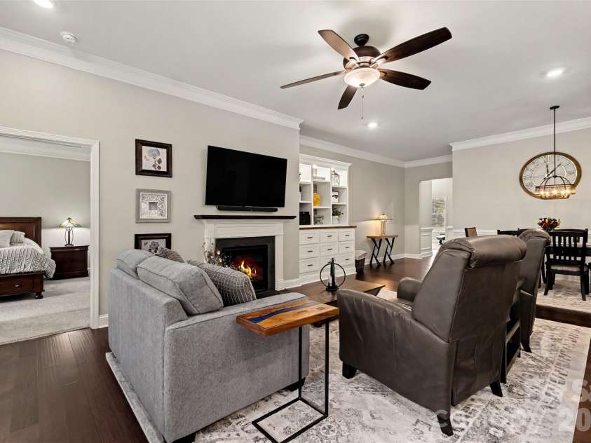 676 Latrobe Drive, Iron Station, NC 28080.  MLS# CAR4401657, YatesRealty ID 45521. Gas fireplace with custom built ins