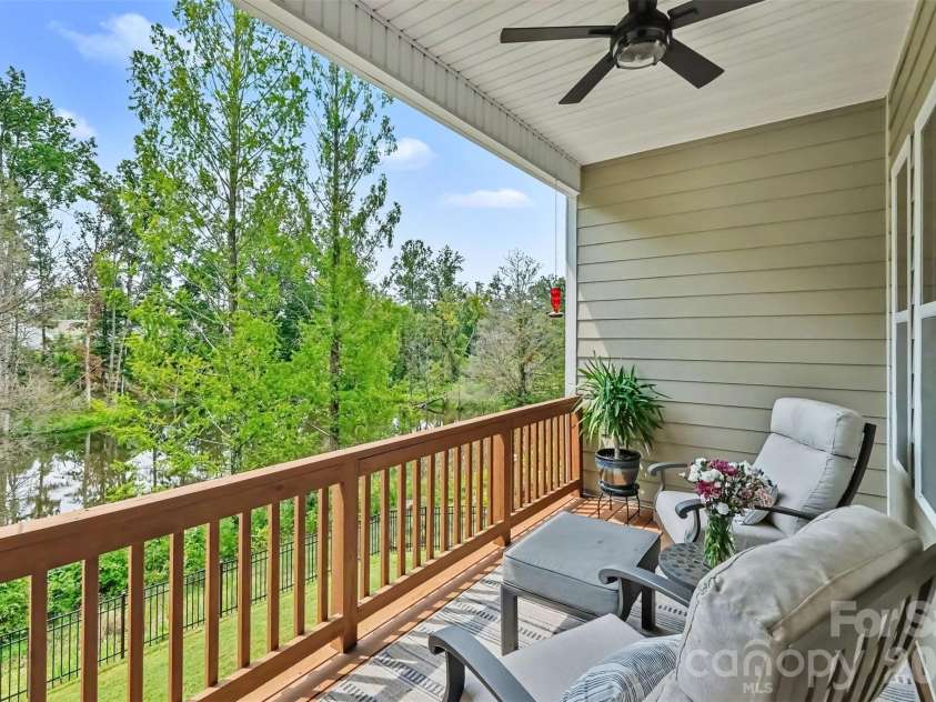 676 Latrobe Drive, Iron Station, NC 28080.  MLS# CAR4401657, YatesRealty ID 45521. Upper deck overlooking the backyard, wonderful spot to relax and enjoy outdoor space