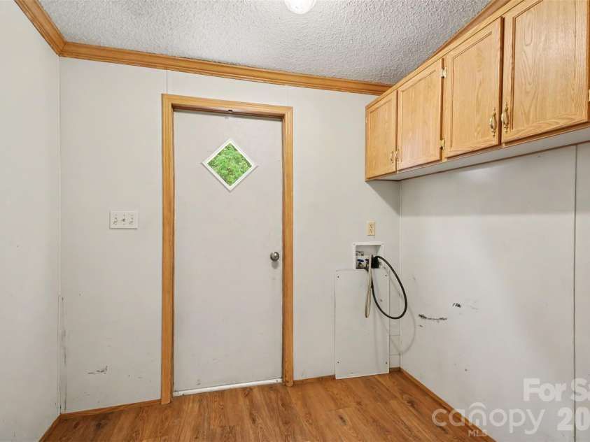 373 Laney Street, Concord, NC 28027.  MLS# CAR4416123, YatesRealty ID 45526. Laundry room